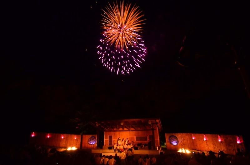Fireworks are seen above an amphitheater at night